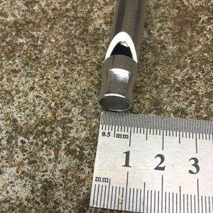 Polished aluminum outdoor survival whistle with 10mm diameter measurement detail