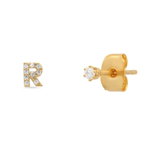 Detailed view of gold S925 letter R earring with zircons and a round stud earring set