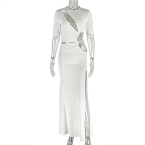 Detail of white slimming dress showing asymmetrical cut-outs and high-stretch fabric