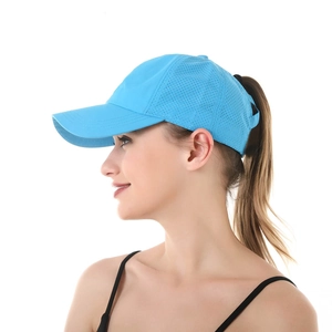 Sky blue mesh ponytail baseball hat with breathable side panels shown from a side view