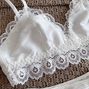 White floral lace bralette and ribbed cotton lingerie set in a minimalist French style