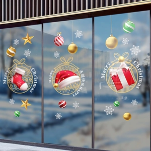 Christmas window stickers set with Santa hats, socks, and snowflakes for glass shop decor