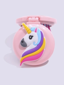 Close-up of pink portable folding hairbrush with a cute 3D unicorn design and mirror