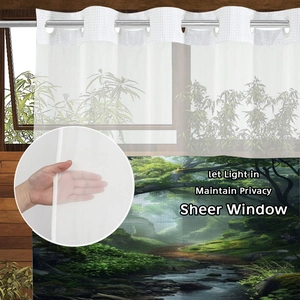 Detail of waffle weave forest shower curtain showing semi-transparent fabric and metal rings