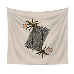 Detail of bohemian tapestry featuring brown palm trees and black wave patterns on beige fabric