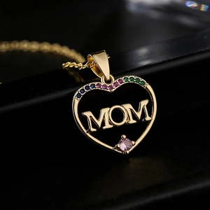 Golden MOM heart pendant necklace with multicolor zircons and a pink crystal stone