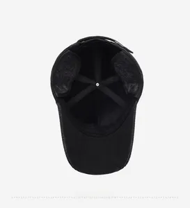 Detail view of thickened thermal lining and ear flap structure of the winter baseball cap