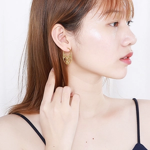 Creative hollow flower drop earrings in gold-plated stainless steel for a stylish look