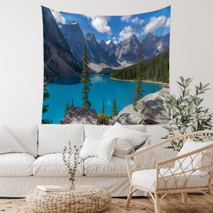 Detailed view of Moraine Lake landscape tapestry in a modern minimalist living room setting