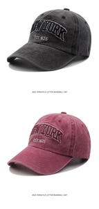 Detail of vintage washed baseball caps with 3D New York embroidery and distressed fabric