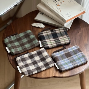 Mini plaid wool coin purses in assorted colors with drawstring and zipper closure