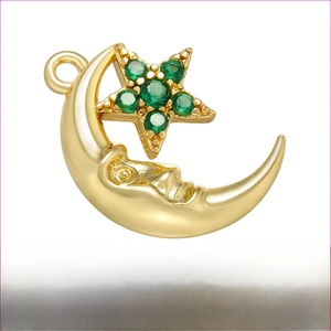 Macro view of gold crescent moon and star pendant with dimensions 13mm by 17mm