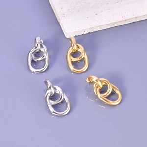 Boucles d'oreilles créoles torsadées en acier inoxydable plaqué or 18 carats et argent de luxe