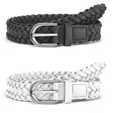 Detail of classic black and white woven belts with minimalist silver metal pin buckles