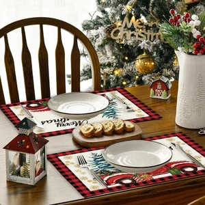 Christmas table mat featuring a red truck and Merry Christmas text with plaid border