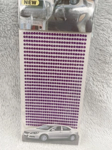 Detail view of 3mm purple round acrylic rhinestone stickers for DIY car and phone decor