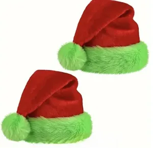 Detail of red velvet Christmas hat with vibrant fluorescent green plush trim and pompom