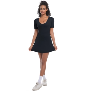 Close-up of black tight-fitting tennis dress featuring short sleeves and a slim A-line cut