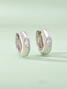 Detailed macro view of S925 sterling silver hoop earrings with marquise-cut zircon stones