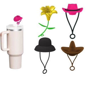 Universal silicone straw toppers including pink cowboy hat and yellow flower decorations