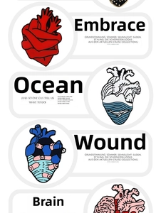 Detail view of anatomy heart enamel pins featuring hug, ocean, trauma, and brain themes