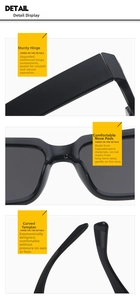 Detail view of reinforced metal hinges and ergonomic temples on black oversized sunglasses