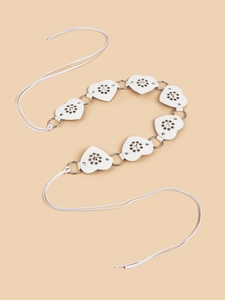 Detailed view of a white heart-shaped leather waist chain with metallic rings and thin cords