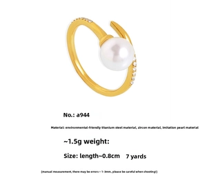 Detailed specs of titanium ring with white pearl, zircons, 1.5g weight and size 7