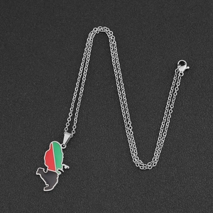 Macro shot of stainless steel Libya map pendant with vibrant flag color oil drip finish