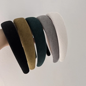 Collection of wide corduroy headbands in black, brown, green, gray and beige colors