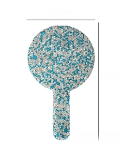 Detailed view of rhinestone handheld mirror, green and silver crystal finish, 170x100mm size