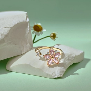 Detailed close-up of S925 sterling silver flower ring with pink crystals and zircon