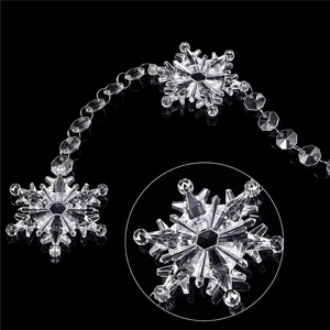 Elegant transparent crystal snowflake ornaments with beaded icicles for festive winter decor