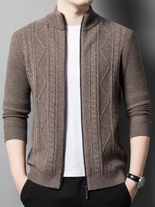 Detailed view of the diamond cable knit pattern on this brown men's cardigan sweater