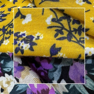 Elastic wide headband for women featuring vibrant African floral prints and soft texture