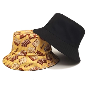 Cappello a secchiello reversibile con stampa a formaggio giallo e design nero