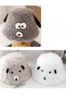 Close-up of fuzzy lamb-style bucket hat with 3D ears and thick plush texture detail
