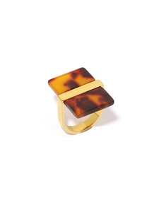 Macro view of retro 18k gold plated U-shaped ring with tortoiseshell acetate inlay