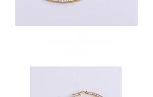 Macro view of gold plated square hoop earrings with micro-pave white crystals