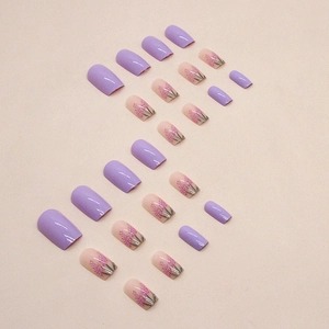 Lavender purple press-on nails with floral designs in a 24-piece square-oval set