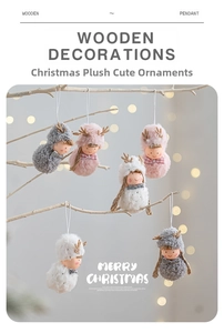 Plush Christmas reindeer doll set in pink and grey hanging on a winter branch