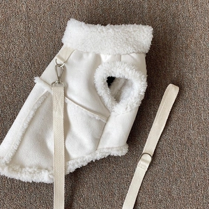 Detail of white suede pet vest with warm fleece lining and matching leash set