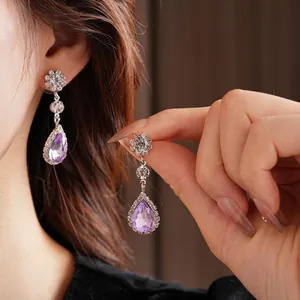 Elegant vintage court style jewelry set with purple pear shaped crystal drops and diamonds