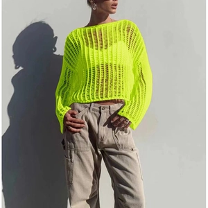 Neon green crochet long sleeve beach cover up with open knit design for summer vacations