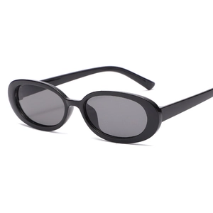 Retro oval black sunglasses with thick plastic frames and dark grey lenses for fashion