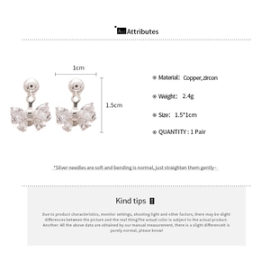 Detailed size and material specs for silver bow earrings with zircon and copper base
