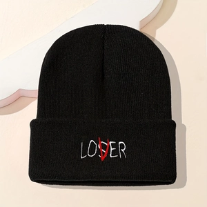 Classic black knitted beanie featuring LOVER embroidery on a minimalist background