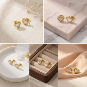 Dettaglio degli orecchini a cuore in conchiglia e oro su diverse superfici