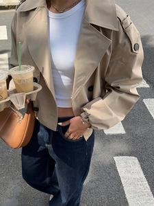 Women's khaki short trench coat with classic lapels and double-breasted button design