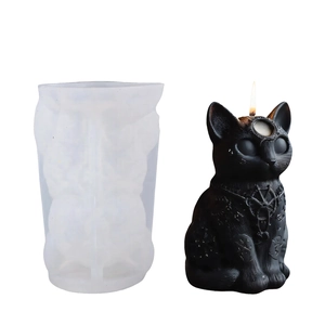 Creative black cat silicone mold with finished candle showing moon and star details